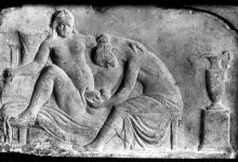 Ancient Roman relief carving of birth